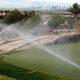 Hotel-casinos on the Las Vegas Strip are seen behind sprinklers watering the golf course at DragonRidge Country Club June 19, 2009 in Henderson, Nevada. According to the Southern Nevada Water Authoity the Colorado River system, Nevada's main source of water, is facing the worst drought on record and Lake Mead's water level has dropped approximately 100 feet since January 2000.